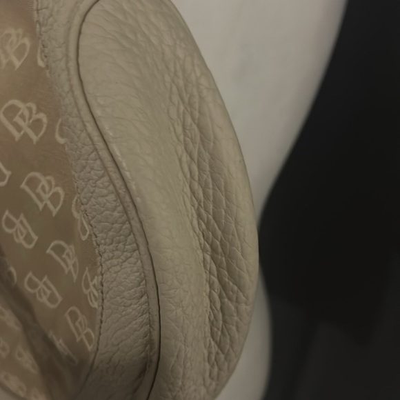Dooney and Bourke vintage hobo purse in the color cream. - Picture 10 of 14